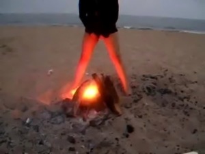 drunken teen peeing off thge fire at the beach free