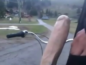 Gay rides bike with dildo in public