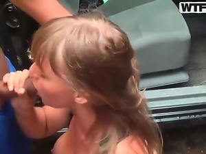 Sweet teen enjoys suckign her boyfriends huge dick while in the car