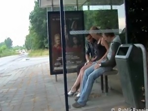Two guys and a girl having sex in public at a bus stop
