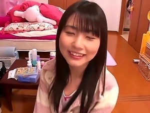 Innocent looking naive black haired japanese teen Tsubomi with natural...
