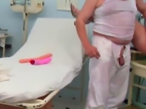 Perverted doctor gets showered with piss while he attends a patient