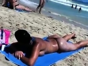Beach Babe Getting A Tan