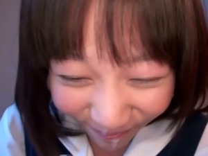 Tiny japanese girl on knees sucking an eager cock.