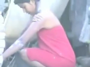 Poor Woman Washing Her Body Outdoors