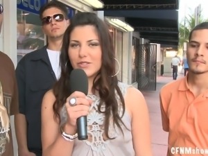 Some reality in public with a smoking hot brunette reporter