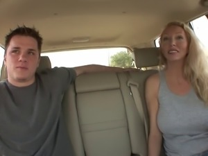 Blonde MILF with juicy tits sucks guy&#039;s tool in the car