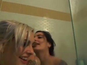 Filthy lesbian girls having passionate sex in the bathroom