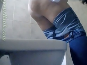 Plump juicy ass of an amateur white girl in the public restroom