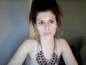 Brunette babe teases on webcam
