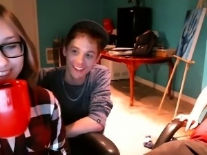 Nerdy amateur teen worships two big sticks on the webcam