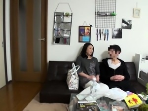 Attractive Asian mom braces herself for a hardcore fucking