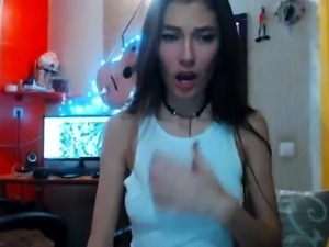 Slim brunette camgirl with lovely tits has a lust for cock
