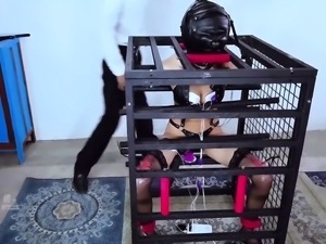 Masked Asian slave in lingerie is addicted to tight spaces