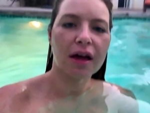 Seductive milf with big boobs fingers herself in the pool