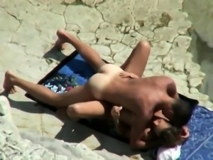 Amateur lovers caught having wild sex at the beach