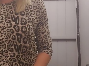 Cute blonde fingering her pussy in bar public bathroom