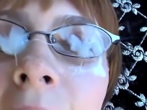 Cum loving brunette with glasses gets facialized outside