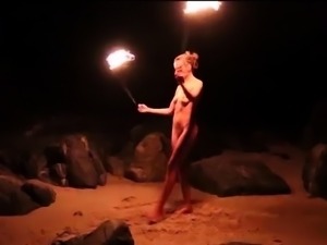 Mysterious milf gives amazing fire dancing performance 