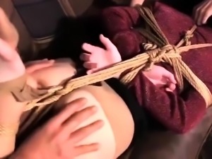 Japanese cutie enjoys powerful orgasms in BDSM threesome