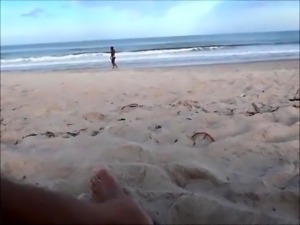 Perverted flasher shows off his cock to women on the beach